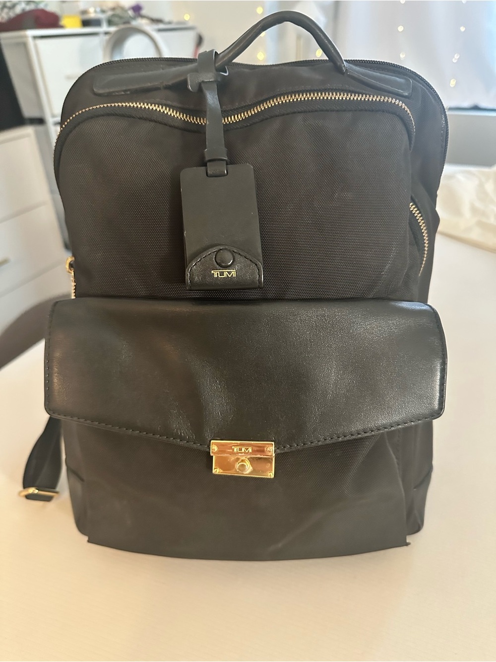 Tumi Black Nylon and Leather Front-Flap Backpack with Gold Hardware